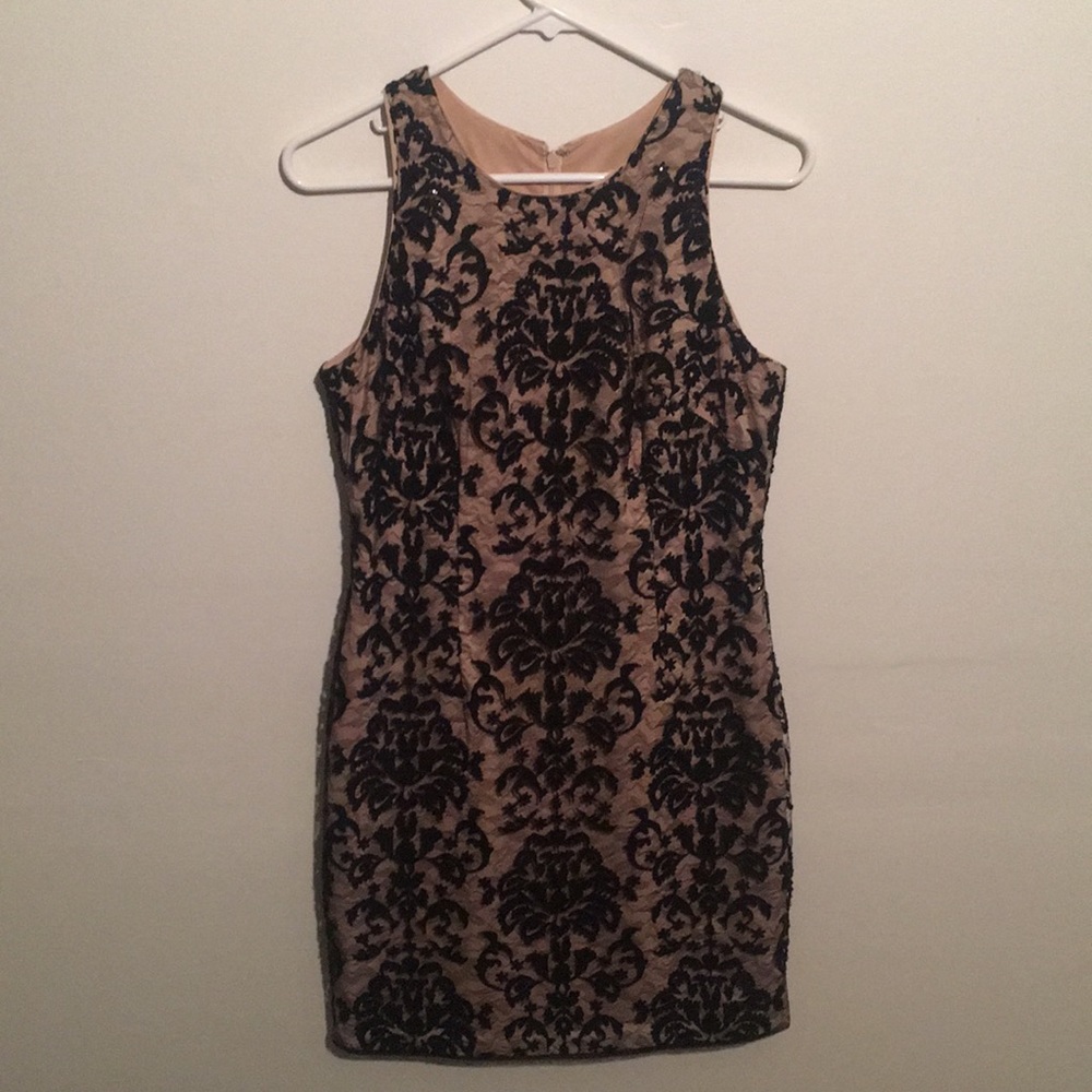 Nude and black cocktail dress
